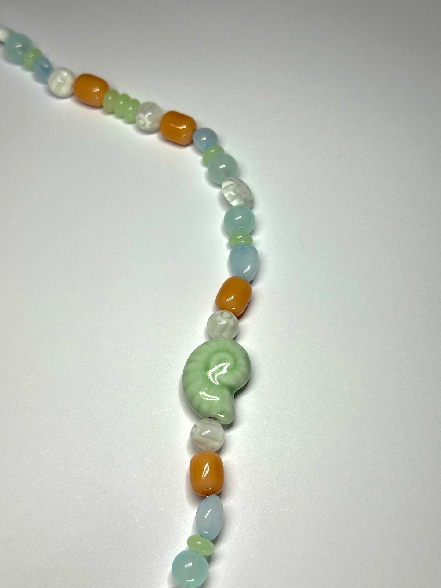 1 OF 1  LIGHT SHELL NECKLACE